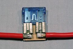 The connectors can be glued to a small scrap of plywood to make a more rigid fuse holder.